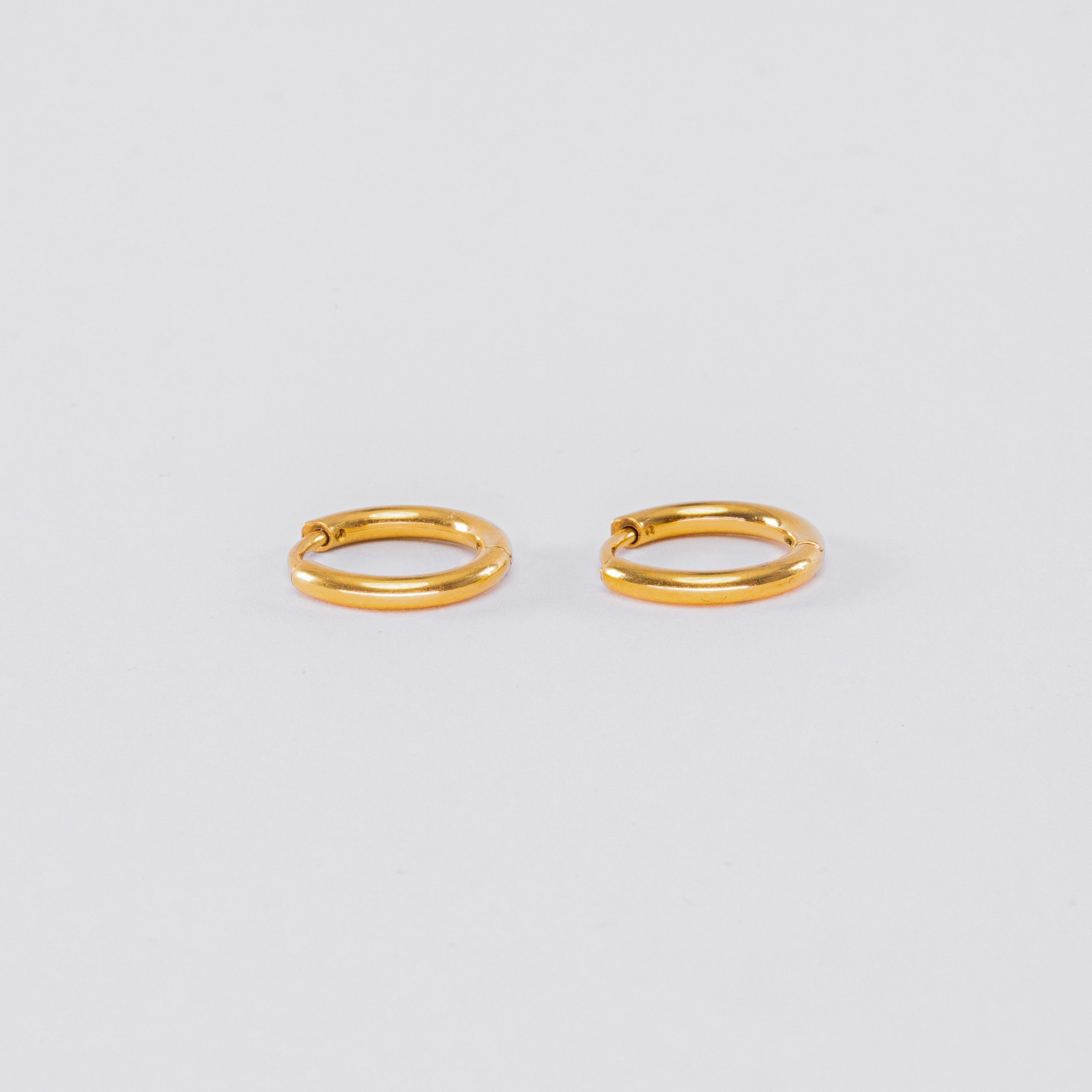 Snuggle Time Mini Hoop Earrings — 18K Gold PVD Stainless Steel Everyday Hoops